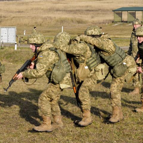oldiers with the Ukrainian Land Forces conduct squad battle drills