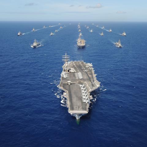 The Nimitz-class aircraft carrier USS Ronald Reagan leads a mass formation of ships from Korea, Taiwan, Japan, Singapore, France, Canada, Australia and the U.S. during Rim of the Pacific 2010. RIMPAC is the