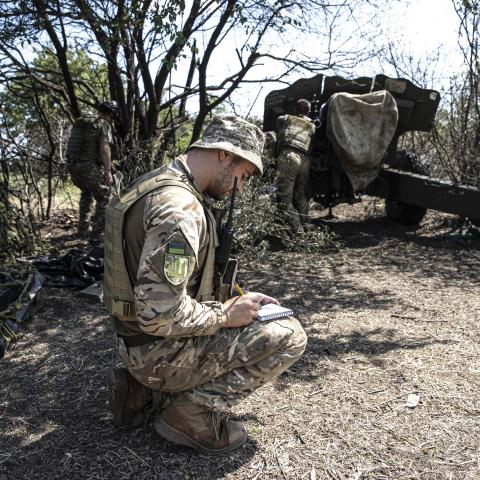 Ukrainian artillerymen check their weapons and special equipment before going to the frontline in Kherson, Ukraine, on July 15, 2022. (Photo by Metin Aktas/Anadolu Agency via Getty Images)