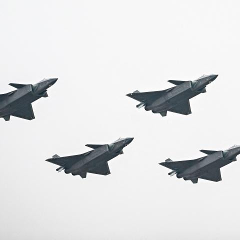 Chinese J-20 stealth fighters of the People's Liberation Army (PLA) perform at the Airshow China 2022 in Zhuhai in southern China's Guangdong province on November 8, 2022. - China OUT (Photo by CNS / AFP) / China OUT (Photo by -/CNS/AFP via Getty Images)