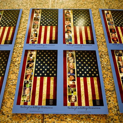 Photos of Americans who died from a fentanyl overdose are displayed at the Drug Enforcement Administration headquarters in Arlington, Virginia, on July 13, 2022. (Agnes Bun/AFP via Getty Images)