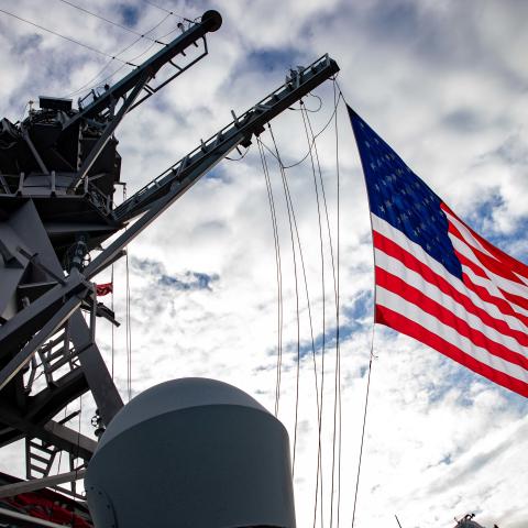 The Arleigh Burke-class guided-missile destroyer USS Ramage (DDG 61) flies the battle ensign during a formation transit as part of the Gerald R. Ford Carrier Strike Group, Oct. 25, 2022. The first-in-class aircraft carrier USS Gerald R. Ford (CVN 78) is on its inaugural deployment conducting training and operations alongside NATO Allies and partners to enhance integration for future operations and demonstrate the U.S. Navy’s commitment to a peaceful, stable and conflict free Atlantic region. (U.S. Navy phot