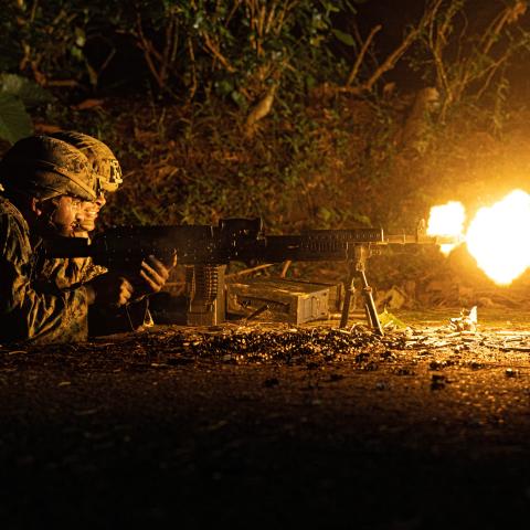 US Marines execute a simulated convoy ambush in Okinawa, Japan, on December 6, 2022. (US Marine Corps Photo by Weston Brown)