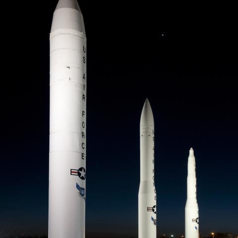 A static display of intercontinental ballistic missiles at the F.E. Warren Air Force Base, Wyo., front gate the evening of April 4, 2012. From left are the Peacekeeper, the Minuteman III and the Minuteman I. The planet Venus is visible in the sky above the Minuteman missiles and Jupiter is visible to the left of the Minuteman I. (U.S. Air Force photo by R.J. Oriez)