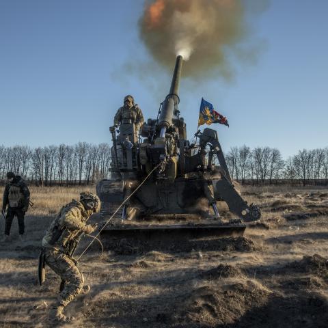DONBAS, UKRAINE - DECEMBER 05: Ukrainian servicemen fire artillery shells at the frontline of Donbas, Ukraine on December 05, 2022. (Photo by Narciso Contreras/Anadolu Agency via Getty Images)