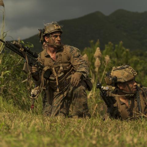 U.S. Marines with 1st Battalion, 2nd Marines conduct a platoon attack during Stand-in Force Exercise on Okinawa, Japan, Dec.11, 2022. SiF-EX is a Division-level exercise involving all elements of the Marine Air-Ground Task Force focused on strengthening multi-domain awareness, maneuver, and fires across a distributed maritime environment. This exercise serves as a rehearsal for rapidly projecting combat power in defense of allies and partners in the region. (U.S. Marine Corps photo by Sgt. Mario A. Ramirez)