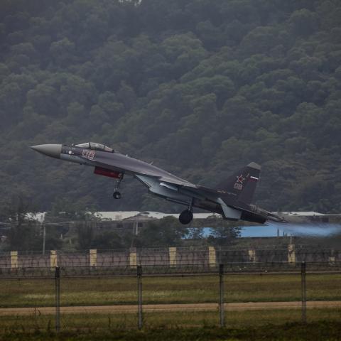 ZHUHAI, CHINA - NOVEMBER 10: Russian Sukhoi SU-35 performs at the Airshow China 2014 in Zhuhai, Guangdong province, November 10, 2014. Airshow China is the only international aerospace trade show in China that is endorsed by the Chinese central g