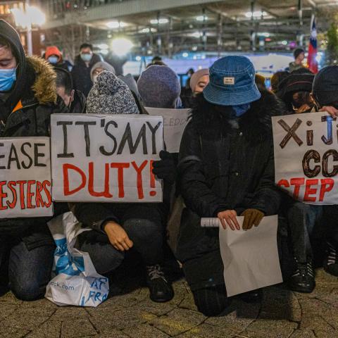 People protesting against China's Zero-COVID policy in solidarity with Urumqi people at Tiananmen Memorial in Chinatown, Boston, on December 2, 2022. (Tang Ka Huen/SOPA Images/LightRocket via Getty Images)