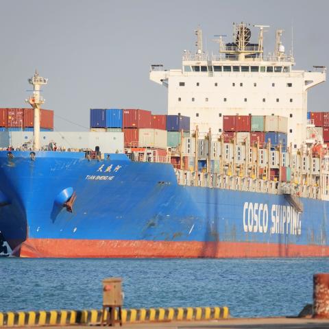 A Cosco Shipping container ship prepares to dock at Yantai, China
