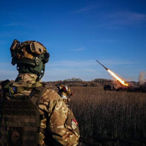  A Ukrainian soldier watches a self-propelled 220 mm multiple rocket launcher firing toward Russian positions on the front line in eastern Ukraine on November 29, 2022. (Anatolii Stepanov/AFP via Getty Images)