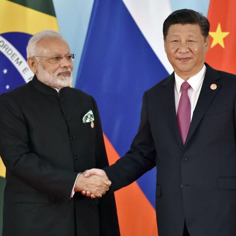 President Xi Jinping (R) and Indian Prime Minister Narendra Modi shake hands before the group photo during the BRICS Summit at the Xiamen International Conference and Exhibition Center in Xiamen, southeastern China's Fujian Province on September 4, 2017. 