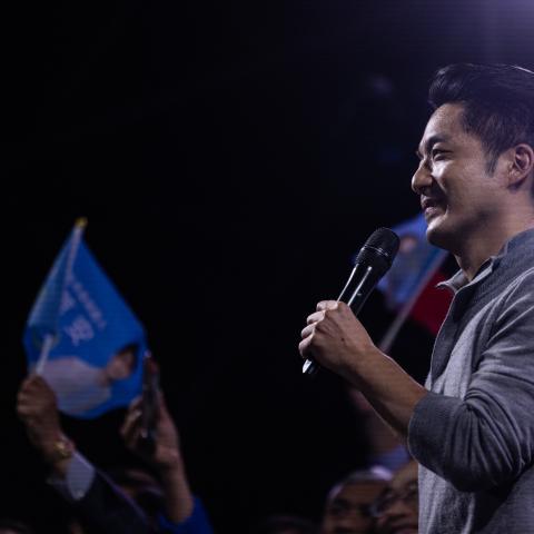 TAIPEI, TAIWAN - NOVEMBER 26: Chiang Wan-an, Taipei mayoral candidate of the opposition Kuomintang (KMT), celebrates his victory in local elections on November 26, 2022 in Taipei, Taiwan. Taiwan holds local elections to appoint mayors, councillors and magistrates in several counties on Saturday. The local elections are a litmus test for the popularity of the ruling DPP as young candidates including the grandson of Chiang Kai-shek, Chiang Wan-an, seek to turn the tide. (Photo by Louise Delmotte/Getty Images)