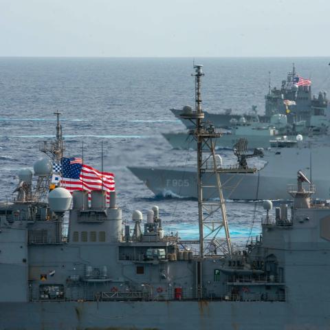 The United Kingdom’s carrier strike group led by HMS Queen Elizabeth and the Japan Maritime Self-Defense Force led by Hyuga-class helicopter destroyer JS Ise conduct multiple carrier strike group operations with US Navy carrier strike groups led by flagships USS Ronald Reagan and USS Carl Vinson in the Philippine Sea on October 3, 2021. (DVIDS)