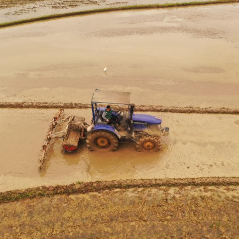 JI'AN, CHINA - MARCH 20: Aerial view of a tractor plowing a field during the Spring Equinox on March 20, 2021 in Ji'an, Jiangxi Province of China. The Spring Equinox starts on March 20 this year. (Photo by Deng Heping/VCG via Getty Images)