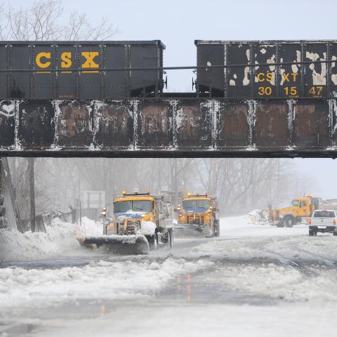 HAMBURG, NY - DECEMBER 24: Plows work to clear ice and snow along the Lake Erie shoreline on December 24, 2022 in Hamburg, New York. The Buffalo suburb and surrounding area was hit hard by the winter storm Elliott with wind gusts over 70 miles per hour battering homes and businesses through out the holiday weekend. (Photo by John Normile/Getty Images)