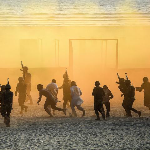 TOPSHOT - Pakistani naval marine take part in a drill during the International Defence Exhibition and Seminar (IDEAS) 2022 at the beach in Karachi on November 17, 2022. (Photo by Rizwan TABASSUM / AFP) (Photo by RIZWAN TABASSUM/AFP via Getty Images)