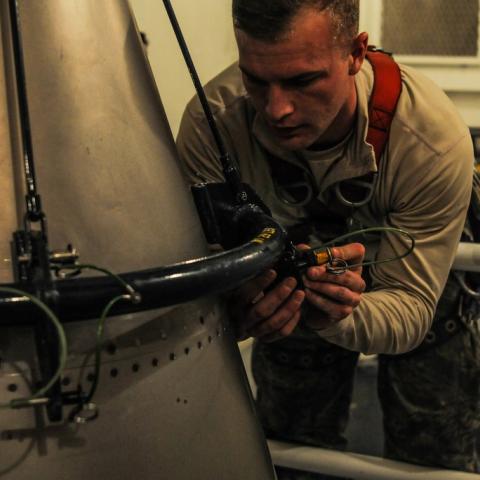 Missile maintainers tear down an ICBM for Maintenance