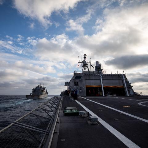SOUTH CHINA SEA (Feb. 19, 2022) – The Independence-variant littoral combat ship USS Tulsa (LCS 16) approaches the dry cargo ship USNS Amelia Earhart (T-AKE 6) for a replenishment-at-sea. Tulsa, part of Destroyer Squadron (DESRON) 7, is on a rotational deployment, operating in the U.S. 7th Fleet area of operations to enhance interoperability with partners and serve as a ready-response force in support of a free and open Indo-Pacific region. (U.S. Navy photo by Mass Communication Specialist 1st Class Devin M.