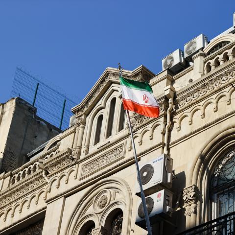 BAKU, AZERBAIJAN - JANUARY 27: The Iranian flag flies outside the country's embassy on January 27, 2023 in Baku, Azerbaijan. According to Azerbaijan's Foreign Ministry a man armed with a Kalashnikov-style rifle attacked the Azerbaijan Embassy in Iran's capital Tehran, an employee of the security service of the embassy was killed, and two more were injured. (Photo by Aziz Karimov/Getty Images)