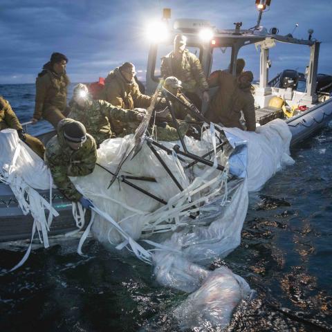 Sailors assigned to Explosive Ordnance Disposal Group 2 recover a high-altitude surveillance balloon off the coast of Myrtle Beach, South Carolina, Feb. 5, 2023. EODGRU 2 is a critical part of the Navy Expeditionary Combat Force that clears explosive hazards to provide access to denied areas; secures the undersea domain for freedom of movement; builds and fosters relationships with trusted partners, and protects the homeland. At the direction of the President of the United States and with the full support o