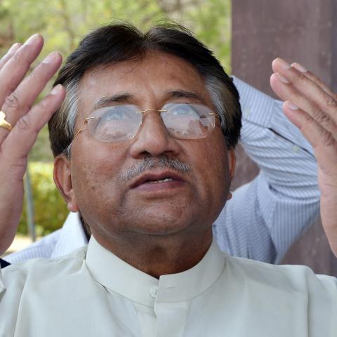 Former President of Pakistan Pervez Musharraf praying at Karachi International Airport, in Karachi, Pakistan, on March 24, 2013. (Aamir Qureshi/AFP via Getty Images)