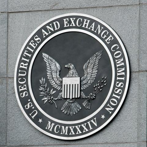 The Securities and Exchange Commission logo hangs on the facade of its building September 18, 2008, in Washington, DC.. (Photo by Chip Somodevilla/Getty Images)