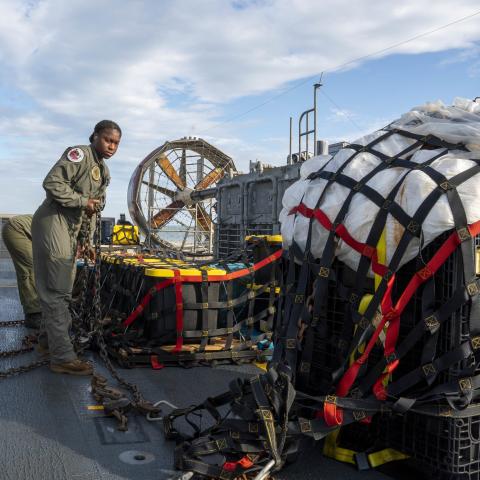 Sailors assigned to Assault Craft Unit 4 prepare material recovered in the Atlantic Ocean from a high-altitude balloon for transport to federal agents at Joint Expeditionary Base Little Creek Feb. 10, 2023. 