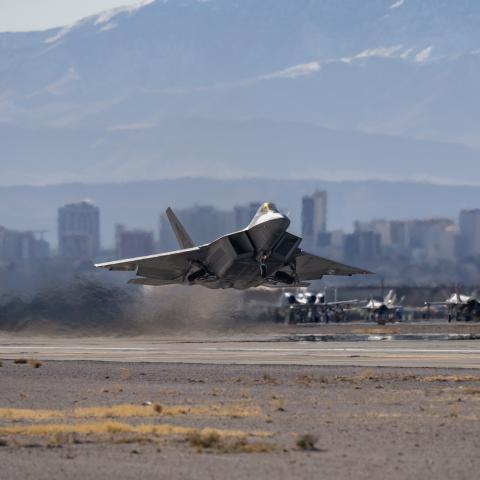 An F-22 Raptor assigned to the 94th Fighter Squadron, Joint Base Langley-Eustis, Virginia, takes off for a Red Flag 23-1 mission at Nellis Air Force Base, Nevada, Jan. 24, 2023.