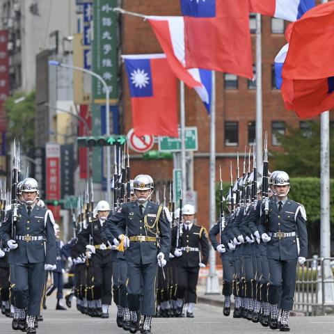 Honour guards take part in a welcome ceremony for Paraguay's President Mario Abdo Benitez and Taiwan's President Tsai Ing-wen in Taipei on February 16, 2023. (Photo by Sam Yeh / AFP) (Photo by SAM YEH/AFP via Getty Images)