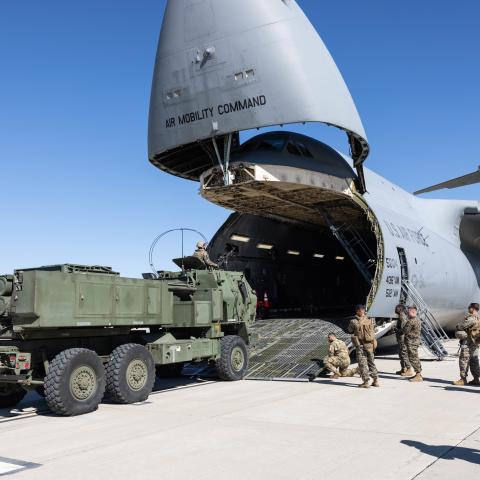 U.S. Marines with 5th Battalion, 11th Marine Regiment, 1st Marine Division, drive an M142 High Mobility Artillery Rocket System onto a U.S. Air Force C-5 Galaxy during a loading exercise at Marine Corps Air Station Camp Pendleton, California, Feb. 7, 2023. Marines with the battalion conducted the exercise in order to rehearse the planning and execution of embarking a self-sustaining platoon on a C-5. (U.S. Marine Corps photo by Cpl. Cameron Hermanet)