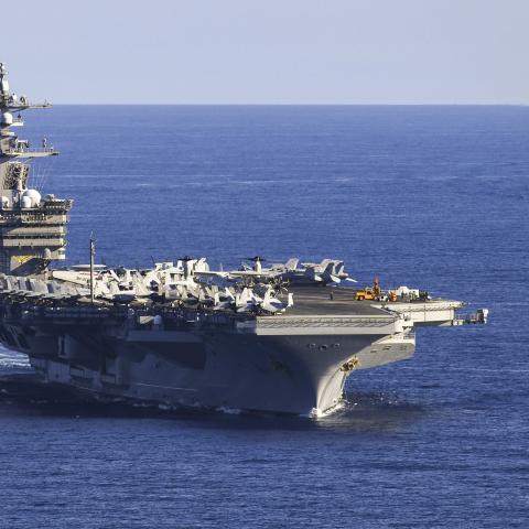 The US Navy aircraft carrier USS Carl Vinson and the Ticonderoga-class guided-missile cruiser USS Lake Champlain transit the South China Sea on November 4, 2021. (US Navy photo by Tyler R. Fraser)