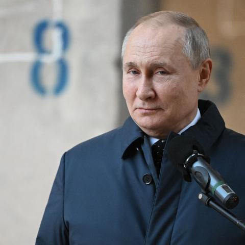 Russian President Vladimir Putin visits the National Space Centre construction site in Moscow on February 27, 2022. (Photo by Sergei Guneyev / Sputnik/ AFP