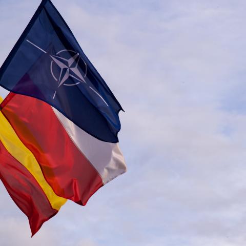 Flags fly outside of a NATO summit in Warsaw, Poland, on July 6, 2016. (NATO via Flickr)