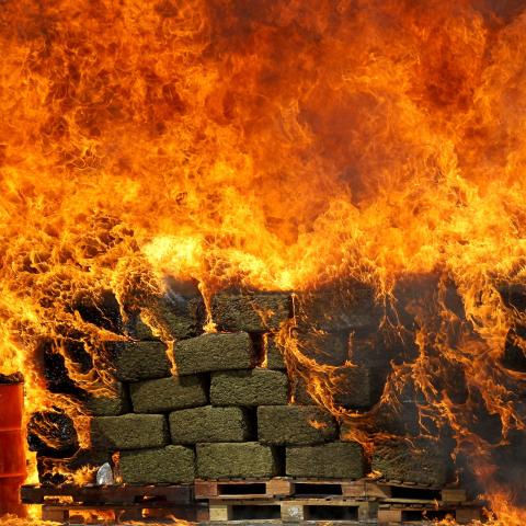 Seized marijuana bricks are incinerated in Guadalajara, Mexico, on March 23, 2018. (Ulises Ruiz/AFP via Getty Images)