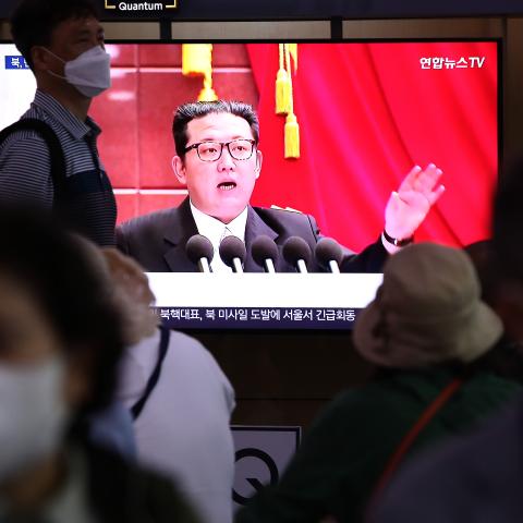 People watch a television broadcast showing a file image of a North Korean leader Kim Jong-Un at the Seoul Railway Station on June 5, 2022, in Seoul, South Korea. (Chung Sung-Jun/Getty Images)
