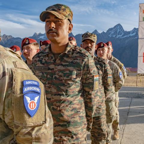 US Army's 11th Airborne Division Soldiers and Indian Army's 71st Mountain Brigade Soldiers stand at parade rest during a rehearsal prior to the closing ceremony for bilateral training exercise Yudh Abhyas 2022 in Auli, India, on December 2, 2022. (US Army Photo by Christopher Dennis)