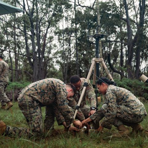 U.S. service members with 3d Battalion, 3d Marines; 3d Radio Battalion, III Marine Expeditionary Force Information Group; and 2nd Infantry Brigade Combat Team, 25th Infantry Division, gauge equipment on a Versatile Radio Observation and Direction on Schofield Barracks, Hawaii, Nov. 16, 2021. Marines with 3d Battalion, 3d Marines participated in a joint electronic warfare training event with 3d Radio Battalion, III MIG, and U.S. Army 25th Infantry Division where Marines and Soldiers learned and effectively u