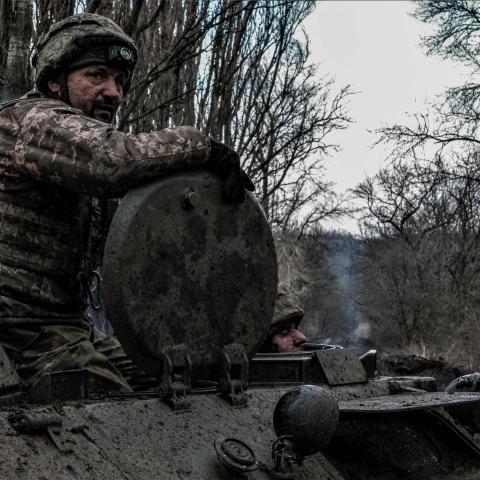 Ukrainian servicemen move towards the front line near Bakhmut, Ukraine, on March 8, 2023. (Sergey Shestak/AFP via Getty Images)