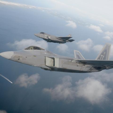 A F-22 Raptor from the 325th Fighter Wing flies alongside a F-35 Lightning II from the 33rd  Fighter Wing over the Emerald Coast. (U.S. Air Force photo by 1st Lt Savanah Bray)