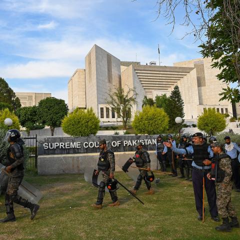 Paramilitary soldiers cordon off the Supreme Court after arrival of Pakistan's former Prime Minister Imran Khan in Islamabad on May 11, 2023. Pakistan's Supreme Court on May 11 declared former prime minister Imran Khan's arrest earlier this week "invalid" after it sparked nationwide civil unrest. (Photo by Aamir QURESHI / AFP) (Photo by AAMIR QURESHI/AFP via Getty Images)