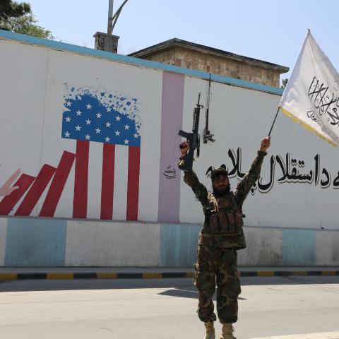 Members of Taliban led government, as well as many Afghan men participate in celebrations marking the 1st anniversary of the US-led troops' withdrawal from the country in Kabul, Afghanistan on August 31, 2022. (Photo by Bilal Guler/Anadolu Agency via Getty Images)