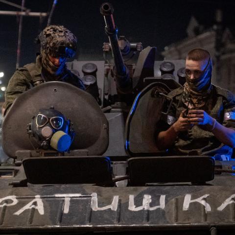  Members of Wagner group looks from a military vehicle with the sign read as "Brother" in Rostov-on-Don late on June 24, 2023. (Photo by Roman Romokhov/AFP via Getty Images)