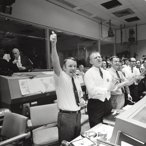 Three of the four Apollo 13 flight directors applaud the successful splashdown of the Command Module Odyssey on April 17, 1970. (NASA via Getty Images)