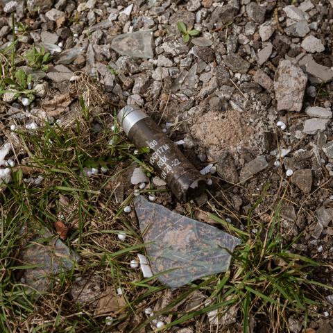 A cluster bomb capsule on the ground amid Russia-Ukraine War at the frontline city of Avdiivka, Ukraine, on March 23, 2023. (Andre Luis Alves via Getty Images)