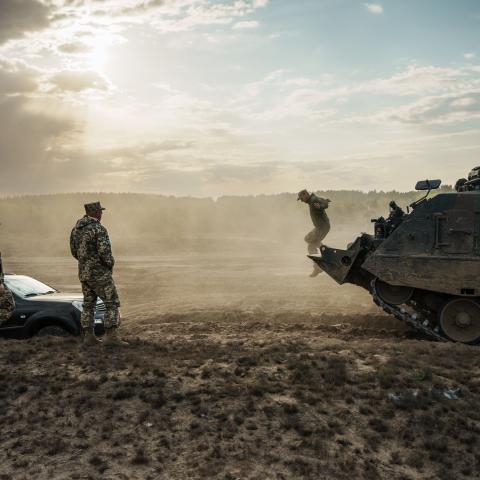 Ukrainian soldiers use an armored engineer vehicle based on a Leopard tank chassis to pull their comrades car from a ditch on May 11, 2023. (Serhii Mykhalchuk/Global Images Ukraine via Getty Images)