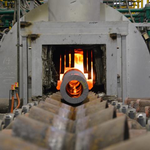 A 155 mm artillery tube enters a heat treatment furnace at Watervliet Arsenal in New York. (John B. Snyder via DVIDS)