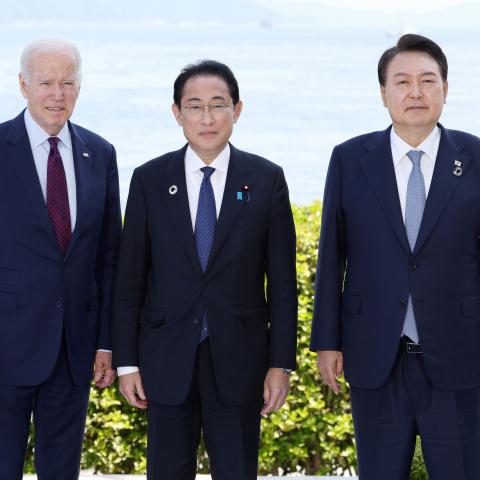 US President Joe Baden, Japanese Prime Minister Fumio Kishida, and South Korean President Yoon Suk Yeol pose prior to the US-South Korea-Japan trilateral meeting on the sidelines of the G7 summit on May 21, 2023, in Hiroshima, Japan. (Asahi Shimbun via Getty Images)