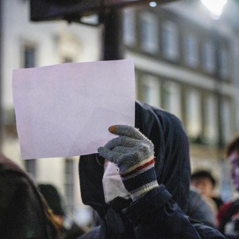 An A4 paper was seen held by a protester during the demonstration outside the Chinese embassy in London on December 5, 2022. (Hesther Ng/SOPA Images/LightRocket via Getty Images)