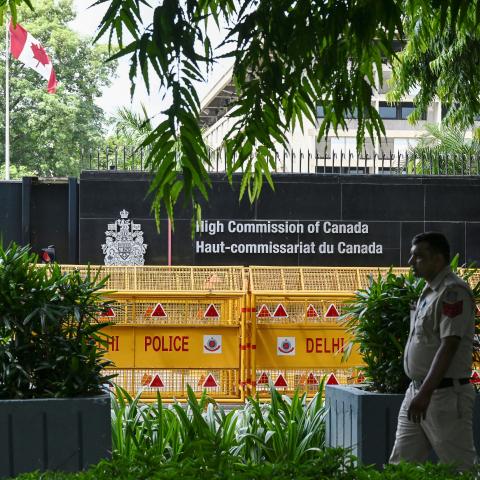Security personnel stand guard in front of the High Commission of Canada in New Delhi on September 19, 2023. (Arun Sankar/AFP via Getty Images)