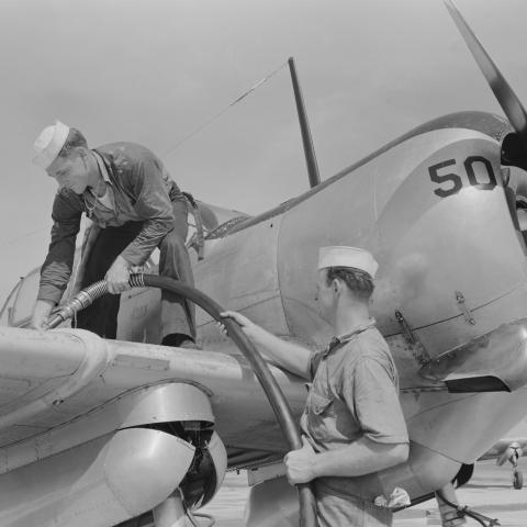 Sailor mechanics filling plane with gasoline at Naval Air Station Corpus Christi, Texas, in  August 1942. (Universal History Archive via Getty Images)